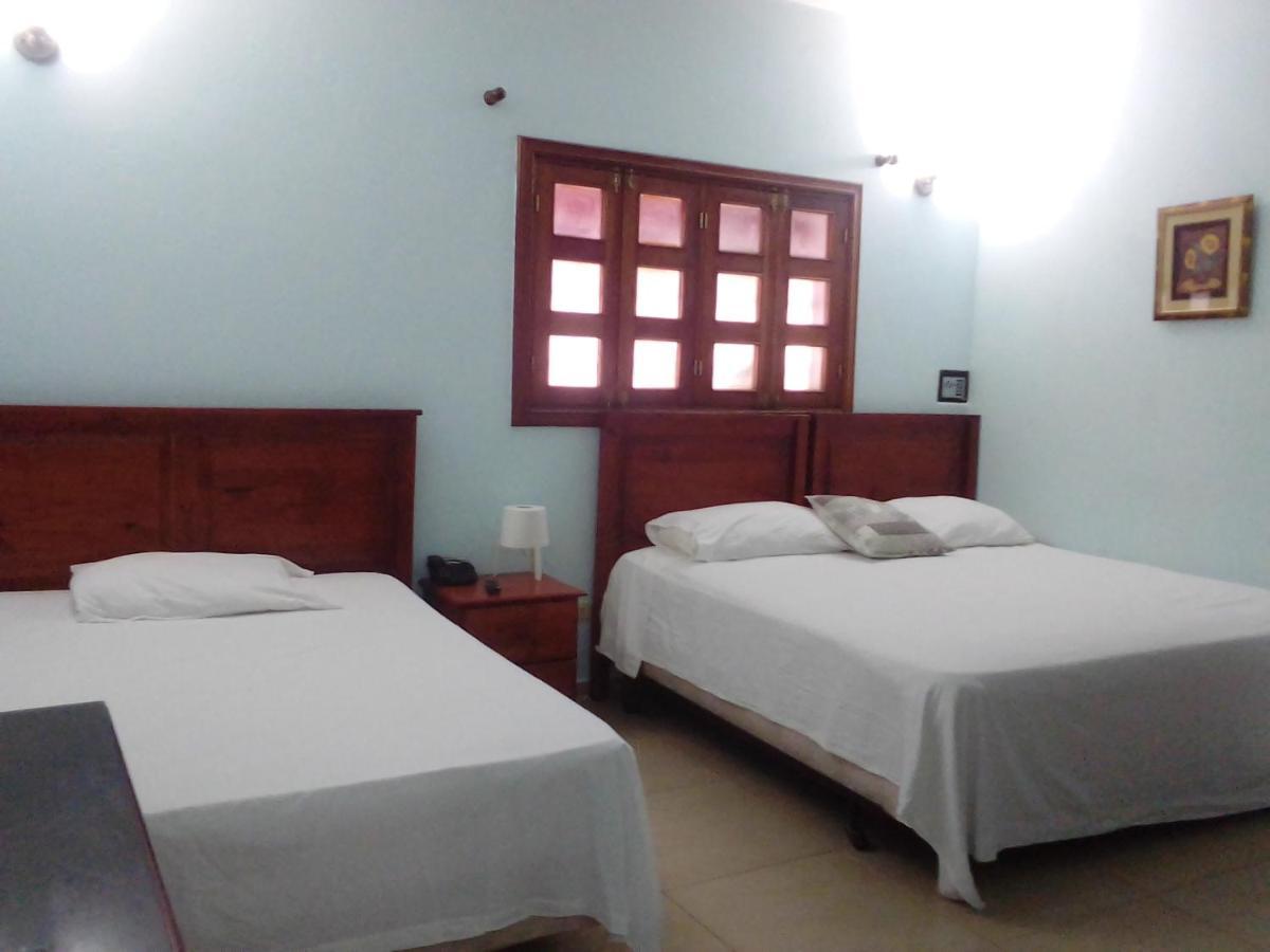 Hotel Aluge Santo Domingo Exterior photo